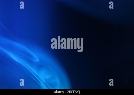 Purple smoke on a dark background, patterns, minimalistic Stock Photo
