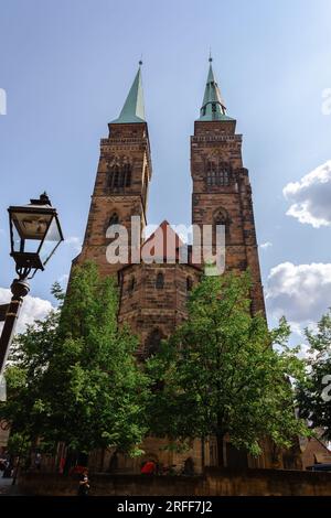 Nuremberg, Germany - July 19, 2023: View of St. Sebaldus Church in historical center of Nurnberg, Franconia, Bavaria  Stock Photo