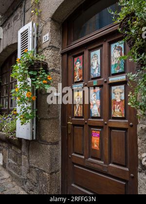 Dinan, France - August 12, 2018: An old door from a house in the city of Dinan, daylight, ancient Stock Photo