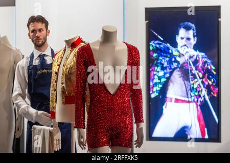 London, UK.  3 August 2023. 'Scarlet sequined stage suit', 1978, at a preview of ‘Freddie Mercury: A World of His Own’ at Sotheby’s.  A month-long public exhibition precedes six auctions in September at Sotheby’s New Bond Street galleries of a collection of possessions owned by Queen’s lead singer kept at his home at Garden Lodge and accrued over the course of fifty years.  Credit: Stephen Chung / Alamy Live News Stock Photo