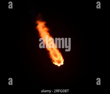 The exhaust plume of the SpaceX Falcon 9 rocket turns red at altitude as it launches the Galaxy 37 communications satellite for Intelsat at 1:00 AM from Launch Complex 40 at the Cape Canaveral Space Force Station, Florida on Thursday, August 3, 2023. Photo by Joe Marino/UPI Credit: UPI/Alamy Live News Stock Photo