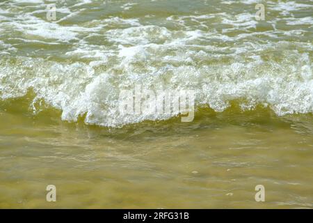 Small waves on the shore of the Baltic Sea in Latvia. Stock Photo