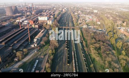 Aerial Top view to railway cylindrical tank shipping containers Rail. Striped creative transport industry representation. railroads and freight trains Stock Photo