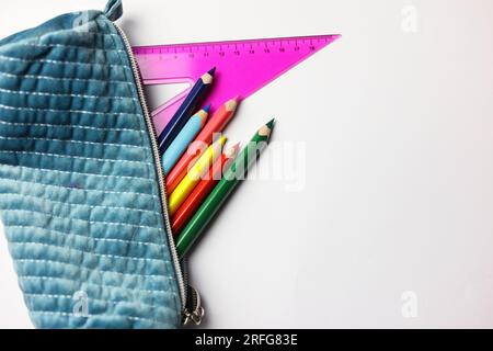back to school concept with school supplies on a white paper background Stock Photo