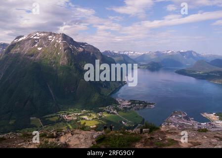 Stunning view down to Romsdalsfjord Andalsnes town and harbour from Nesaksla Mountain accessed from Romsdalsgondolen Andalsnes Norway Europe Stock Photo