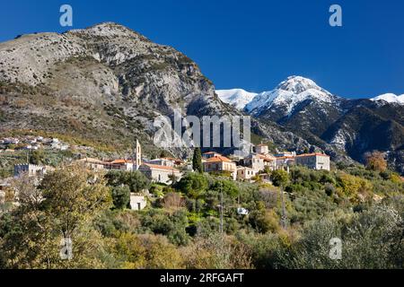 The village of Chora in Exochori in the Mani peninsula of Greece with the Taygetos mountain range beyond. Stock Photo