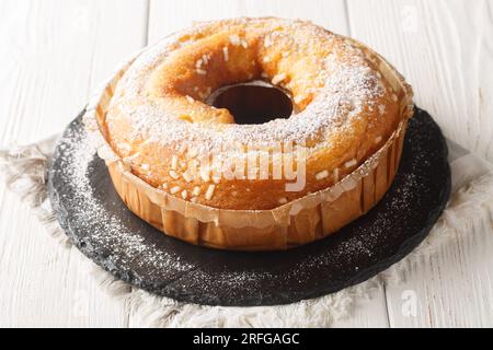 Homemade Ciambella is a classic Italian ring-shaped cake closeup on the table. Horizontal Stock Photo
