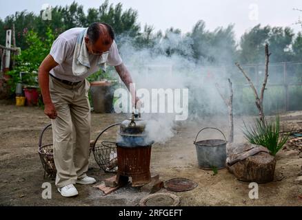 230803 TONGLIAO Aug. 3 2023 Xinhua Bai Shun boils water