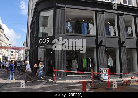 25 May 2023/ Consumers wait at Louis Vuitton store in danish capital  Copenhagen on stroeget pedestrain stree. (Photo.Francis Joseph Dean/Dean  Pictures Stock Photo - Alamy