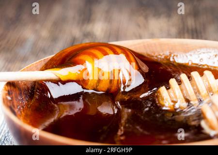 natural viscous honey, which is produced by honey bees, honey is packaged and used in food because it contains a large amount of carbohydrates and is Stock Photo