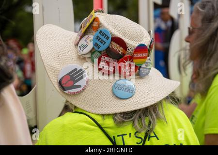 Washington DC, Illinois, USA. 3rd Aug, 2023. THURSDAY, August 3, Washington DC: A Democrat with a hat adorned with buttons on the National Mall. (Credit Image: © Dominic Gwinn/ZUMA Press Wire) EDITORIAL USAGE ONLY! Not for Commercial USAGE! Stock Photo