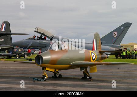 Gloster E.28/39 (Gloster Whittle, Gloster Pioneer or Gloster G.40) was the first British jet aircraft and first flew in 1941. Replica with RAF Typhoon Stock Photo