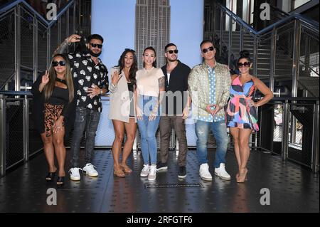 New York, USA. 03rd Aug, 2023. ‘Jersey Shore Family Vacation' cast members (l-r) Nicole ‘Snooki' Polizzi, Paul 'DJ Pauly D' DelVecchio, Sammi 'Sweetheart' Giancola, Jenni 'JWOWW' Farley, Vinny Guadagnino, Mike ‘The Situation' Sorrentino, and Deena Nicole Cortese visit the Empire State Building, New York, NY, August 3, 2023. (Photo by Anthony Behar/Sipa USA) Credit: Sipa USA/Alamy Live News Stock Photo