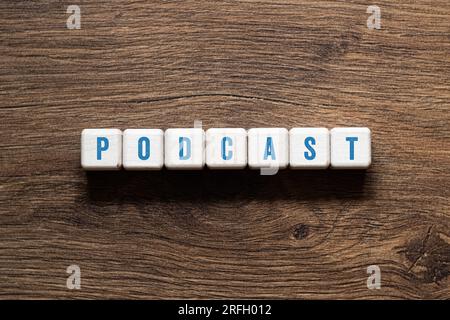 Podcast - word concept on building blocks, text Stock Photo
