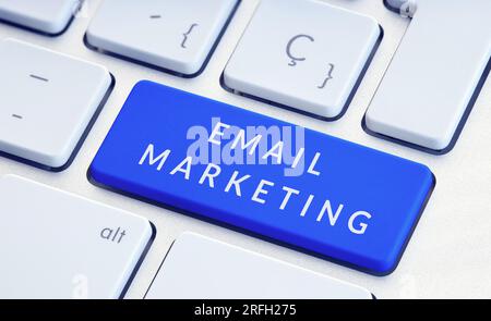 Email Marketing concept. Phrase on blue computer Keyboard Key Stock Photo