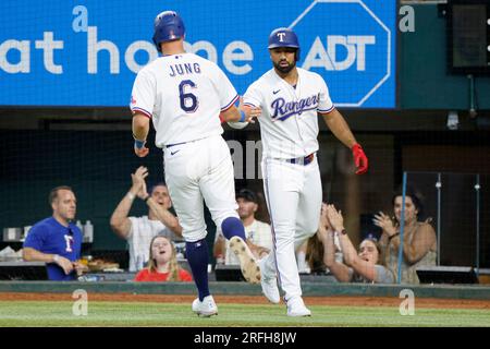 Texas Rangers' Ezequiel Duran is congratulated by Marcus Semien (2) after  hitting a two-run home run against the New York Yankees during the fifth  inning of a baseball game Saturday, April 29