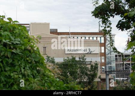 Slough, Berkshire, UK. 3rd August, 2023. Following the sale of the former Akzo Nobel Decorative paint manufacturing site in Wexham Road, Slough, an Enabling Works Planning Application by American Data Centre Company, Equinix, Inc has been submitted to Slough Borough Council. The Enabling Works Application includes the demolition of the remaining buildings on the site including the former Akzo Nobel Research & Development buildings (pictured). A long row of mature tall conifer trees on the site that run parallel with Wexham Road have recently been felled. The tree wood chippings are piled up on Stock Photo