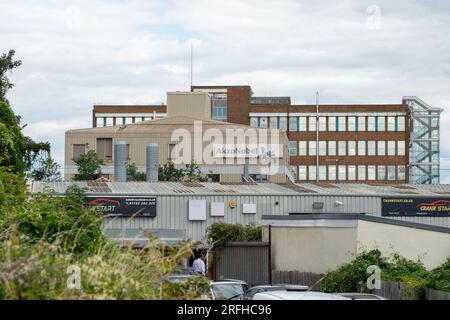 Slough, Berkshire, UK. 3rd August, 2023. Following the sale of the former Akzo Nobel Decorative paint manufacturing site in Wexham Road, Slough, an Enabling Works Planning Application by American Data Centre Company, Equinix, Inc has been submitted to Slough Borough Council. The Enabling Works Application includes the demolition of the remaining buildings on the site including the former Akzo Nobel Research & Development buildings (pictured). A long row of mature tall conifer trees on the site that run parallel with Wexham Road have recently been felled. The tree wood chippings are piled up on Stock Photo