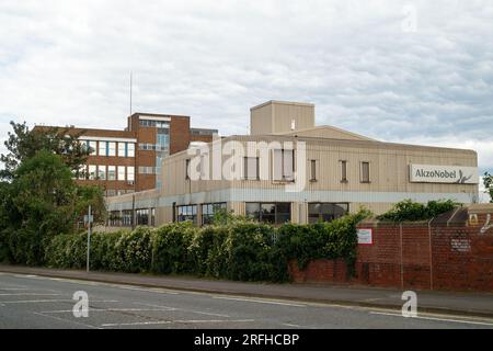 Slough, Berkshire, UK. 3rd August, 2023. Following the sale of the former Akzo Nobel Decorative paint manufacturing site in Wexham Road, Slough, an Enabling Works Planning Application by American Data Centre Company, Equinix, Inc has been submitted to Slough Borough Council. The Enabling Works Application includes the demolition of the remaining buildings on the site including the former Akzo Nobel Research & Development buildings (pictured). A long row of mature tall conifer trees on the site that run parallel with Wexham Road have recently been felled. The tree wood chippings are piled up on Stock Photo