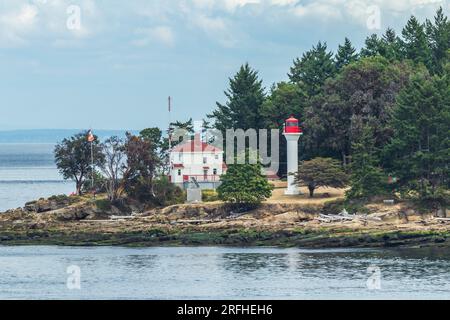 Active Pass Lighthouse on Mayne Island in Gulf Islands, British Columbia, Canada. Stock Photo