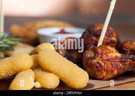 deep fried cheese sticks with other dishes, deep fried cheese dishes in the restaurant Stock Photo