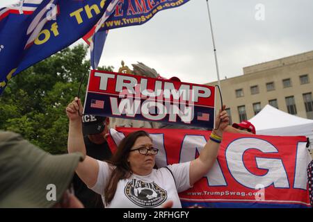 Washington, DC, USA. 3 Aug 2023. A supporter of former U.S. president Donald Trump holds up a sign outside the courthouse where he was arraigned on federal charges related to the U.S. Capitol riots of January 6, 2021. Credit: Philip Yabut/Alamy Live News Stock Photo