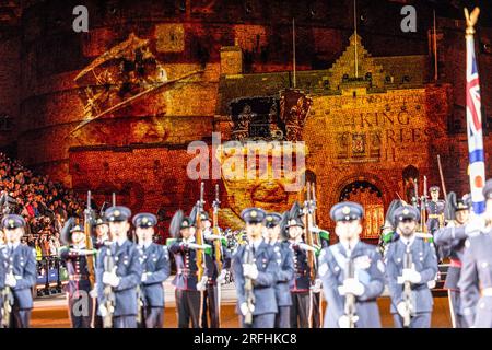 Edinburgh, United Kingdom. 03 August, 2023 Pictured: A projection of Queen Elizabeth II nd King Charles III during the playing of the National Anthem. Royal Edinburgh Military Tattoo takes place on the Esplanade of Edinburgh Castle with the theme of Stories. Credit: Rich Dyson/Alamy Live News Stock Photo