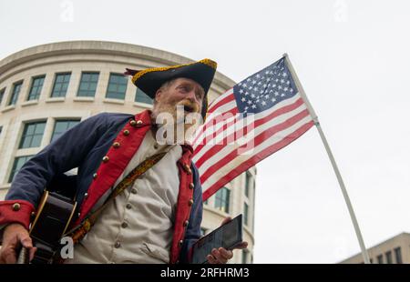 Washington DC, Illinois, USA. 3rd Aug, 2023. THURSDAY, August 3, Washington DC: A supporter of former president Donald Trump holds a rally while dressed as a member of the US colonial militia outside the E. Barrett Prettyman US Federal Courthouse after Trump is arraigned on federal charges related to the January 6, 2021 US Capitol riot and insurrection. (Credit Image: © Dominic Gwinn/ZUMA Press Wire) EDITORIAL USAGE ONLY! Not for Commercial USAGE! Stock Photo