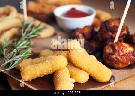 deep fried cheese sticks with other dishes, deep fried cheese dishes in the restaurant Stock Photo