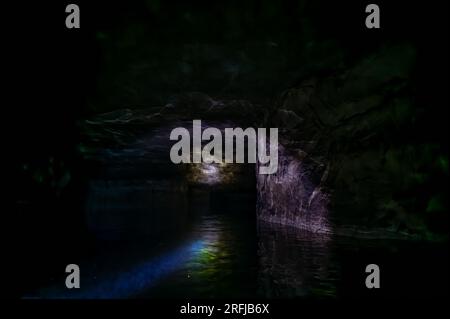 Kayaking a abandoned silica mine that is flooded with water. Stock Photo