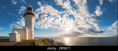 Sunrise over the Pacific Ocean at Cape Byron Lighthouse, Byron Bay, New South Wales, Australia Stock Photo