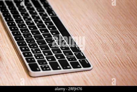 Close up of black keyboard, selective focus on some buttons. Computer keyboard on office desk Stock Photo