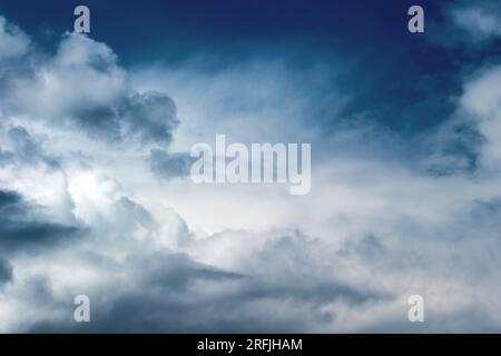 Gray big dramatic clouds. Storm-cloud. Stock Photo