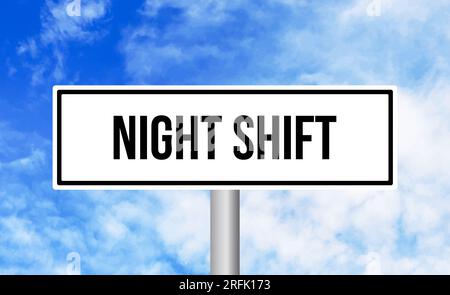 Road Shift Sign Night shift road sign on blur background Stock Photo - Alamy