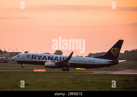 Cork Airport, Cork, Ireland. 04th August, 2023. Wheels up for a Ryanair Boeing 737 at dawn as it departs to London Stansted from Cork Airport, Ireland.  - Credit: David Creedon / Alamy Live News Stock Photo