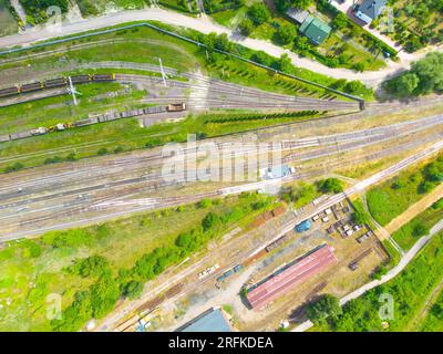 Cargo trains close-up. Aerial view of colorful freight trains on Stock Photo