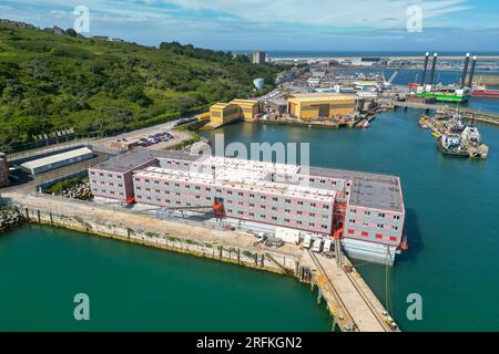 Portland, Dorset, UK.  4th August 2023.  General view from the air of the Bibby Stockholm asylum seekers barge at Portland Port near Weymouth in Dorset.  Arrival of the first asylum seekers has been delayed due to concerns of fire safety and staff training.  It will eventually house up to 500 migrants for the next 18 months.  Picture Credit: Graham Hunt/Alamy Live News Stock Photo