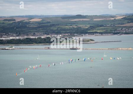 Sailing boats in Portland Harbour, Dorset. The first Met Office-named storm of the year will hit the UK this weekend with gusts of up to 65mph expected to batter the coastlines. Picture date: Friday August 4, 2023. Stock Photo