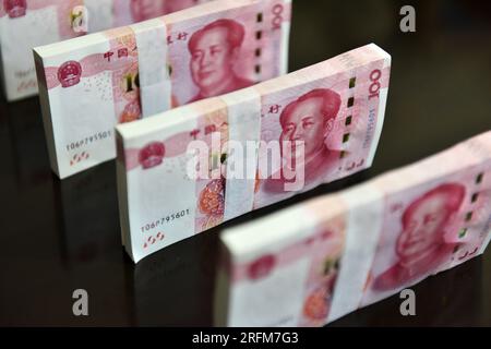 In this photo illustration notes of Chinese currency RMB, with the ...