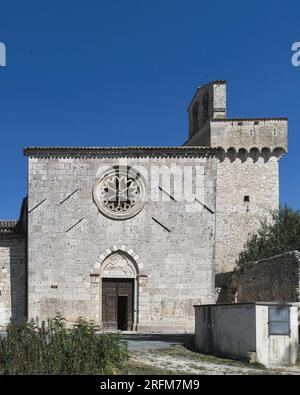 Church of Santa Maria in Pantano (VI-VII century) near Massa Mariana (Umbria, Italy). Square stone facade with nearby 14th century tower. Stock Photo
