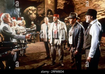 Indiana Jones and the Last Crusade Year : 1989 - USA Director : Steven Spielberg Julian Glover, Denholm Elliott, John Rhys-Davies, Harrison Ford, Sean Connery Stock Photo