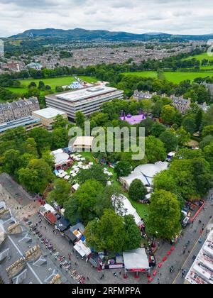 Edinburgh, Scotland, UK. 4th August 2023. Aerial views of George Square Gardens which  is a major venue for the Fringe. The gardens host The Assemby’s Spiegeltent and Underbelly venues. To rear is Underbelly’s Circus Hub  on The Meadows. Iain Masterton/Alamy Live News Stock Photo