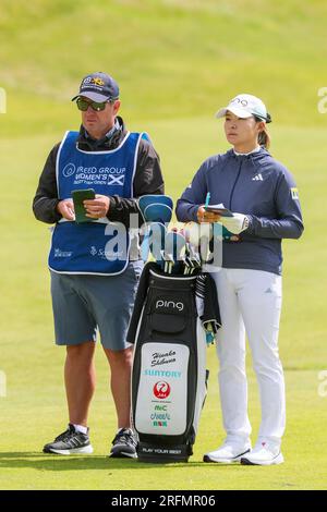 Irvine, UK. 04th Aug, 2023. The second day of the Trust Golf Women's Scottish Open Golf Tournament at Dundonald Links Golf Course, near Irvine, Ayrshire, Scotland, UK saw the 145 competitors play in sunny conditions with a moderate breeze. Hinako Shibuno and caddie waiting to play on the third fairway. Credit: Findlay/Alamy Live News Stock Photo