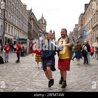 Royal Mile, High Street, Scotland, UK. 4th August 2023.Edinburgh Fringe 2023 begins in the city centre with various pitches around the city for street perfomers to entertain audiences. Credit: some of the cast from Bampots, 2-15 Aug. Pleasance Dome. Credit: AWhite/alamy live news. Stock Photo