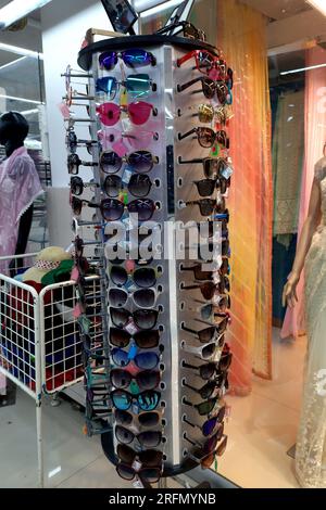 18-10-2021 Indore, M.P. India. Many sunglasses on display in shop. Fashion Sunglasses in shop Stock Photo