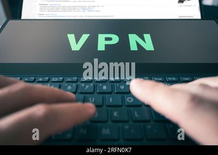 Word VPN on a black laptop. Networks and IT concept. concept of private network security. Stock Photo