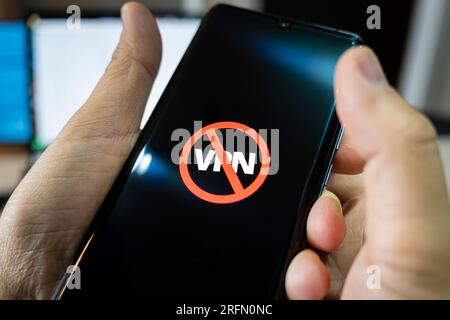 circumvention of sanctions is a concept. Ban on the use of VPN on a smartphone. Stock Photo