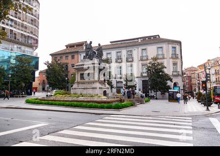 Granada, Spain - February 23, 2022: Monument to the Ferdinand and Isabel at Plaza Isabel La Catolica in Granada, Spain. Stock Photo