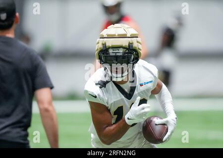 New Orleans Saints wide receiver Chris Olave (12) runs through drills at  the NFL team's football training camp in Metairie, La., Friday, Aug. 4,  2023. (AP Photo/Gerald Herbert Stock Photo - Alamy