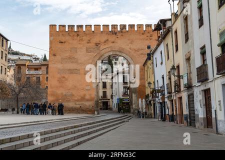 Granada, Spain - February 23, 2022: Puerta de Elvira is an arch gate in Granada, Spain. It was declared Bien de Interes Cultural in 1896. Stock Photo